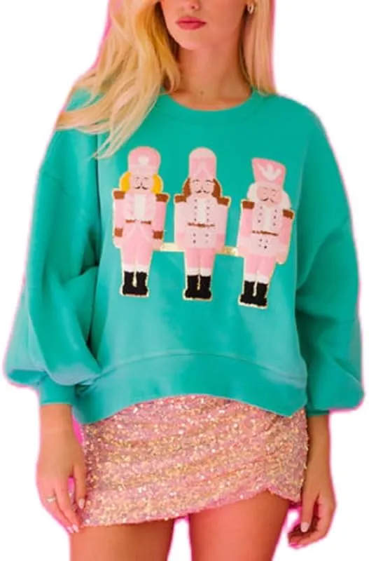 Juakoso Sequin Christmas Sweatshirts for Women Santa Nutcracker Oversized Sweater Shirts Long Sleeve Pullover Hoodies